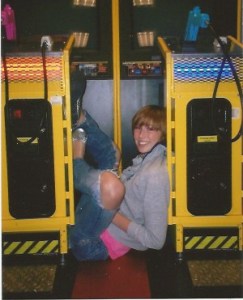 There she is between two arcade games and I don't know why, but whatever.